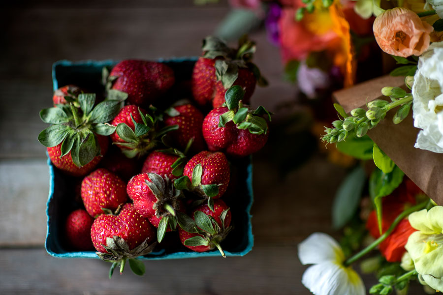 Fresh strawberries ready to be devoured with some homemade whipped cream