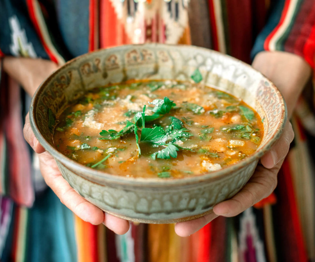 Farrell holding Ribollita Soup.